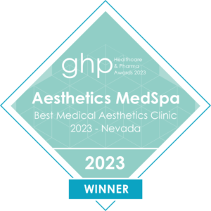 Diamond-shaped award badge for Aesthetics MedSpa in Reno, recognized as the Best Medical Aesthetics Clinic 2023 in Nevada by the GHP Healthcare & Pharma Awards.