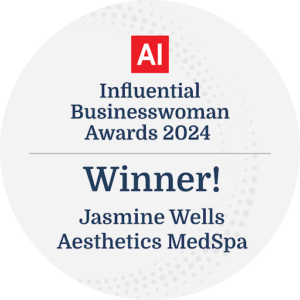 A round badge for "AI Influential Businesswoman Awards 2024" with "Winner! Jasmine Wells, Aesthetics MedSpa" text in the center.