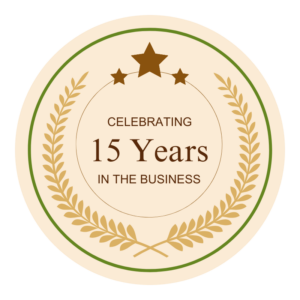 Circular badge with laurel wreath, stars, and text: "Celebrating 15 Years in the Aesthetics Med Spa Business.