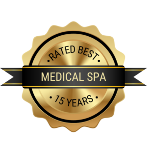 Gold badge with black ribbon reads, "Rated Best Aesthetics Med Spa in Reno 15 Years.