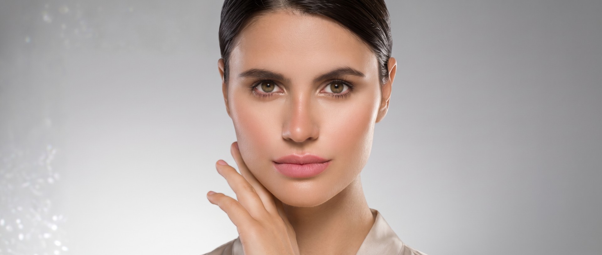 Close-up of a woman's clear, smooth facial skin following a professional laser acne treatment.